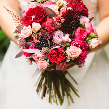 Bridal bouquet with red and pink flowers