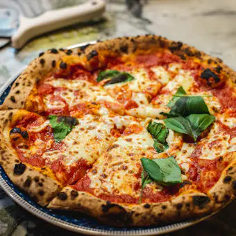 Pizza with basil