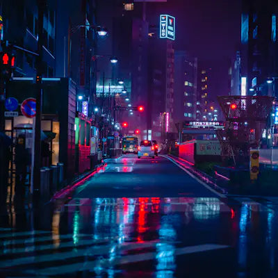 Wet street at night with neon lights