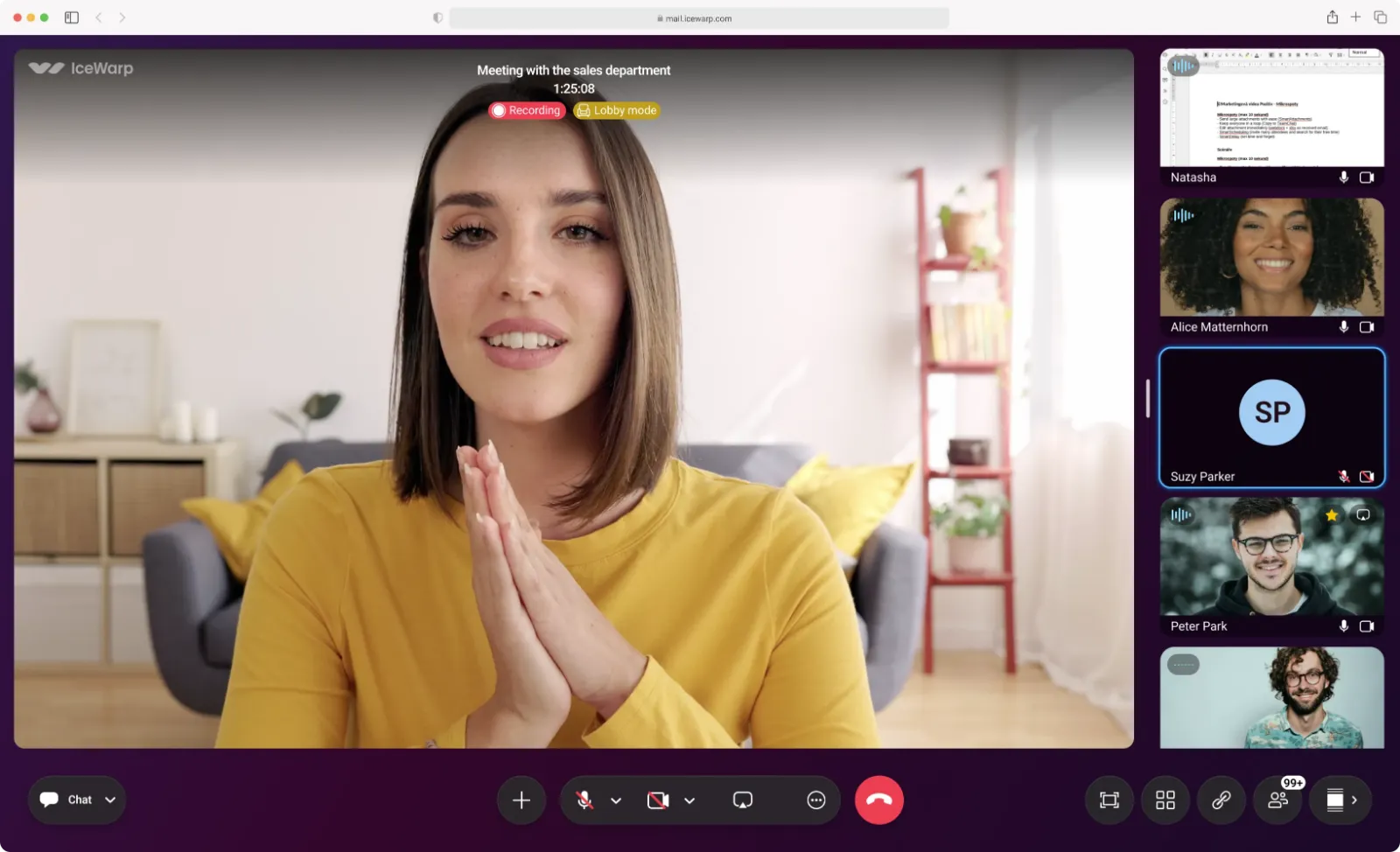 Screenshot of IceWarp in the browser: video conference with one speaker shown large and other participants at the side.