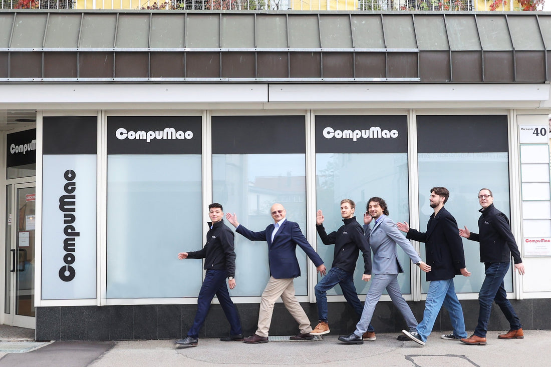 The CompuMac team outside the store in Friedrichshafen